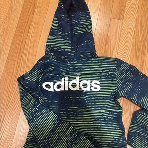Two used Adidas sweatshirts in good condition. Size 10-12